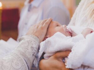 The Sacrament Of The Baptism Of A Child. Selective Focus.